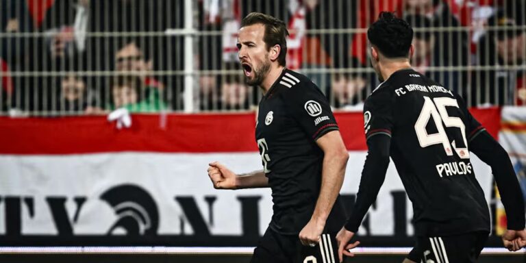 Harry Kane celebrating a goal for Bayern Munich, representing the Bundesliga's record-breaking €5 billion season.