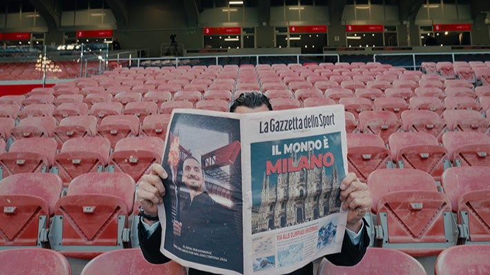 AC Milan 'Welcome to Milan' brand activation featuring city landmarks and Zlatan Ibrahimović for the Milano Cortina 2026 Winter Olympics.