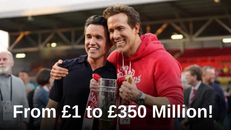 Ryan Reynolds and Rob McElhenney celebrating a Wrexham victory at the Racecourse Ground, symbolizing the club's 2026 success.