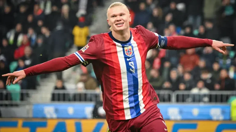 Norway national football team players Erling Haaland and Martin Odegaard celebrating during a 2026 FIFA World Cup qualifying match.