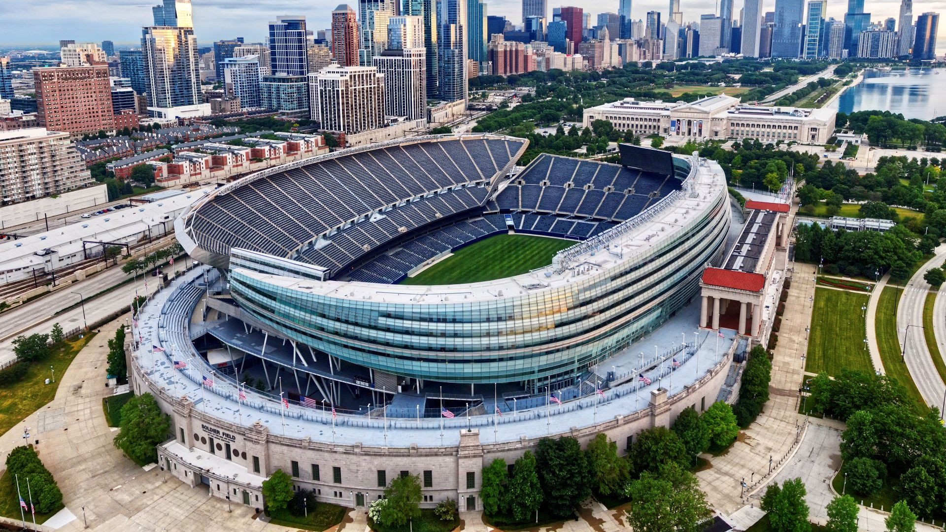 Aerial view of Soldier Field in Chicago during a concert, illustrating the proposed transition to an entertainment-first venue.