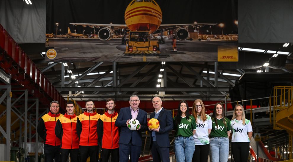 DHL and FAI officials announcing the four-year sponsorship extension for Irish football logistics and the Football in Schools programme.