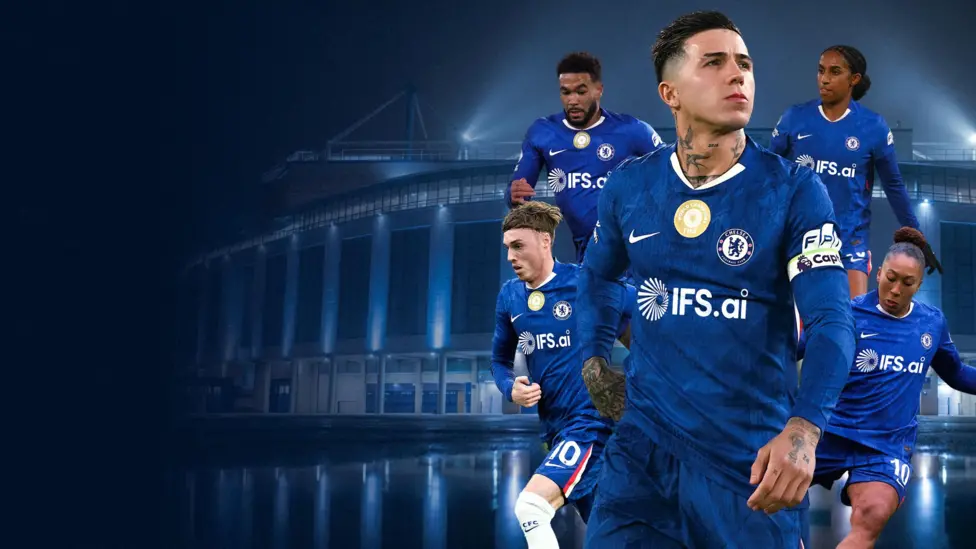 The new Chelsea home kit featuring the IFS logo being modeled at Stamford Bridge.