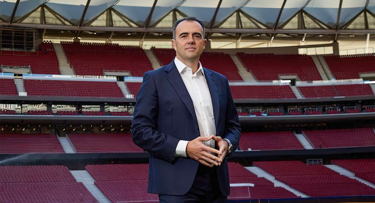 Professional football agents shaking hands representing the AS1 expansion in Europe.