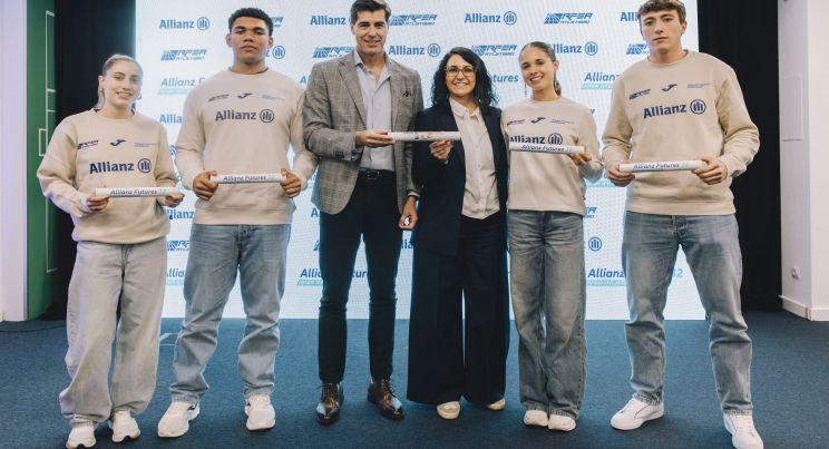 Group of young Spanish athletes training under the Allianz Futures program at a stadium in Madrid
