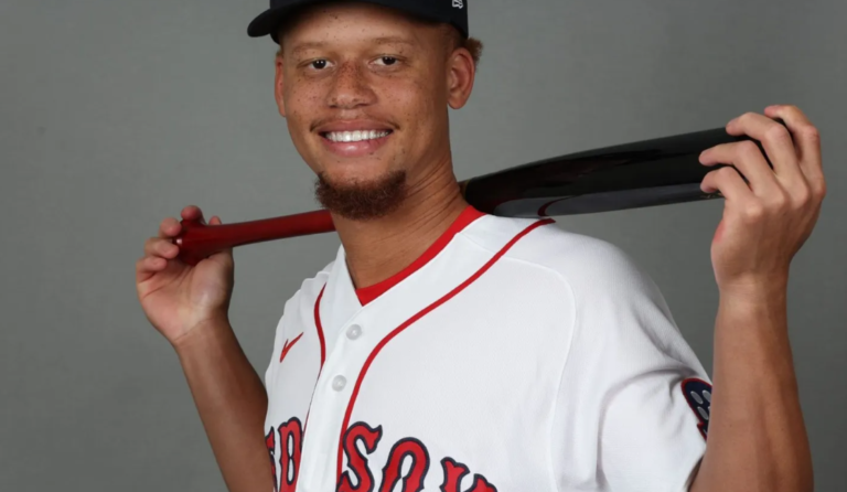 Close-up of a 2026 Red Sox home jersey showing the letter D touching the red piping.