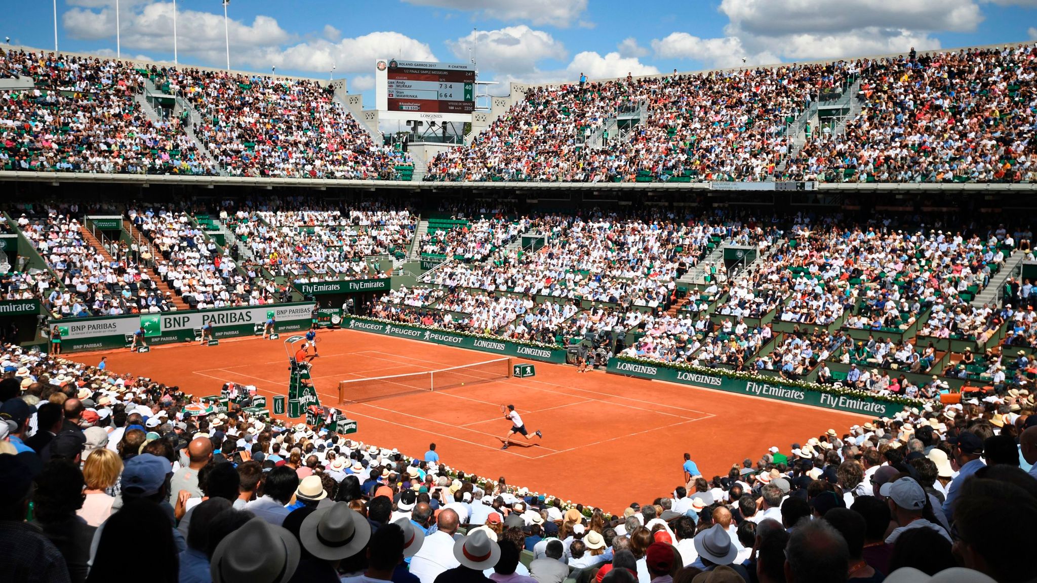 Zheng Qinwen competing on a clay court, representing the rise of Chinese tennis and the new Tencent-FFT partnership.