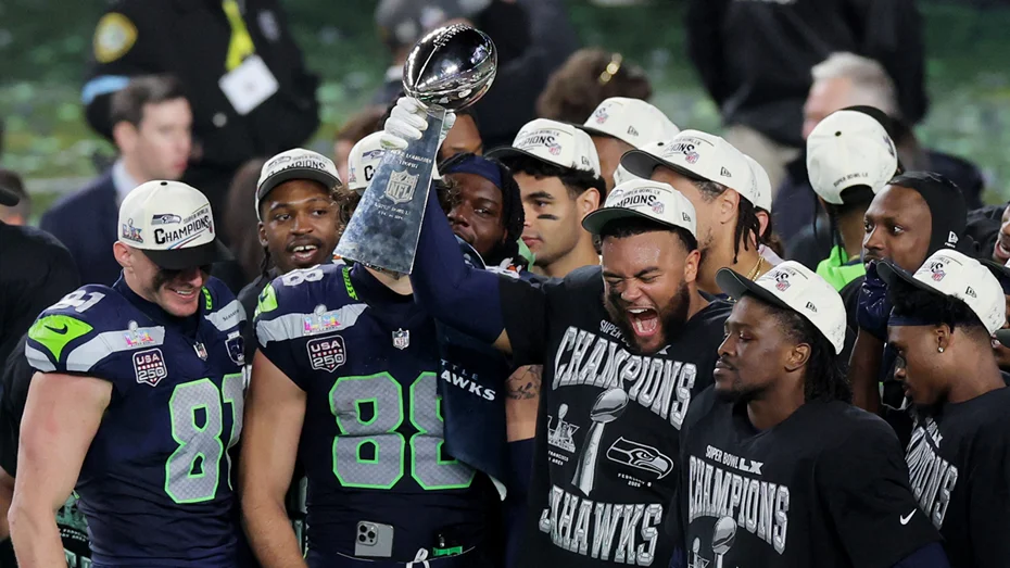 Sam Darnold and Kenneth Walker III of the Seattle Seahawks celebrating the Super Bowl 2026 win