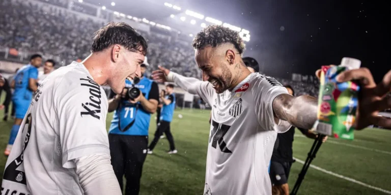 Neymar celebrates a goal with Santos teammates during a 2025 Brazilian SÃ©rie A match