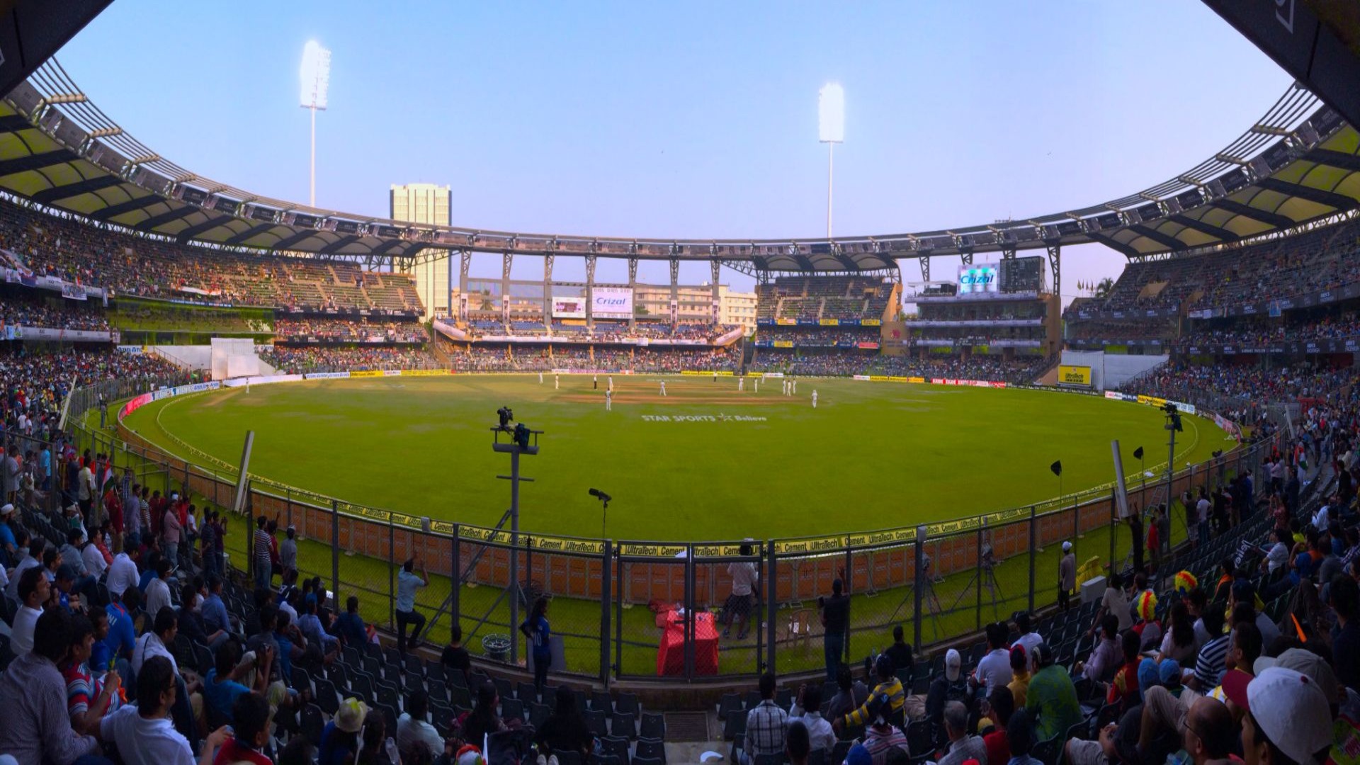 The Mumbai Cricket Association (MCA) is moving forward with plans to build a new 100,000-capacity stadium after identifying a potential site in Navi Mumbai. According to reports, the land acquisition process has begun following a meeting between MCA president Ajinkya Naik and City and Industrial Development Corporation (CIDCO) managing director Vijay Singh. The project had previously been linked to a 50-acre plot in Amane, located in Maharashtraâ€™s Thane district, but focus has now shifted to a site closer to the upcoming Navi Mumbai International Airport. Naik described the development as a â€œdefining momentâ€ for the regionâ€™s sports infrastructure, emphasizing its potential to elevate cricket in Mumbai and strengthen Maharashtraâ€™s presence on the global stage. The planned venue is expected to support player development while expanding opportunities for emerging talent. Mumbai already hosts several major cricket venues, including the Wankhede Stadium, DY Patil Stadium and Brabourne Stadium. If completed, the new stadium would rank among the largest in the world, though it would still trail the Narendra Modi Stadium in Ahmedabad, which has a capacity of 132,000 and hosted the 2023 Cricket World Cup final.